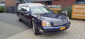 Cadillac blauwe rouwauto - foto 1